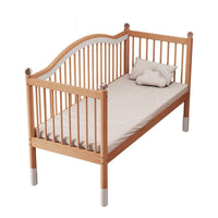 Children's solid wood bed with adjustable height.