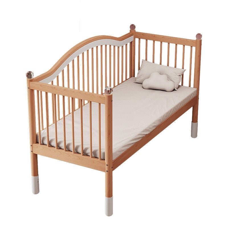 Children's solid wood bed with adjustable height.